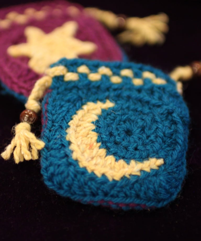 crochet sun and moon pouches