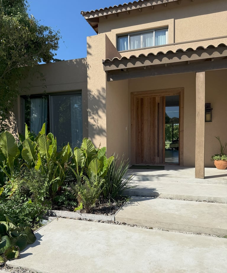 a house with a large front door and a large front door