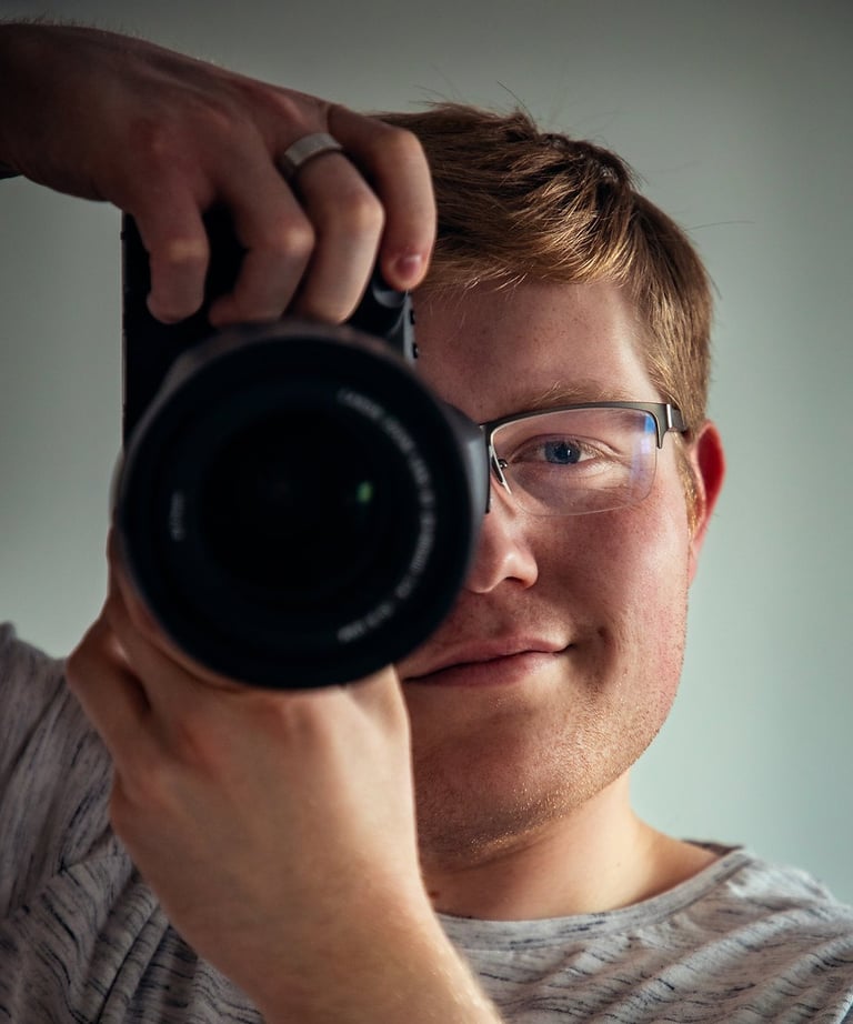 a man taking a picture of himself taking a picture of himself