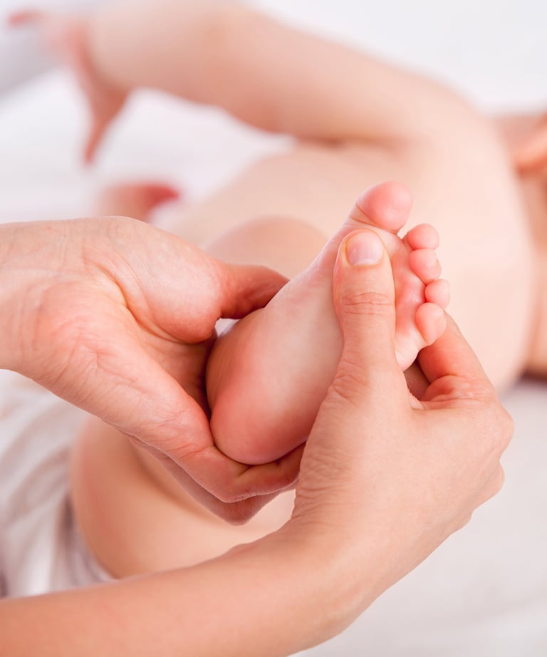 a baby's feet and feet are shown in this picture