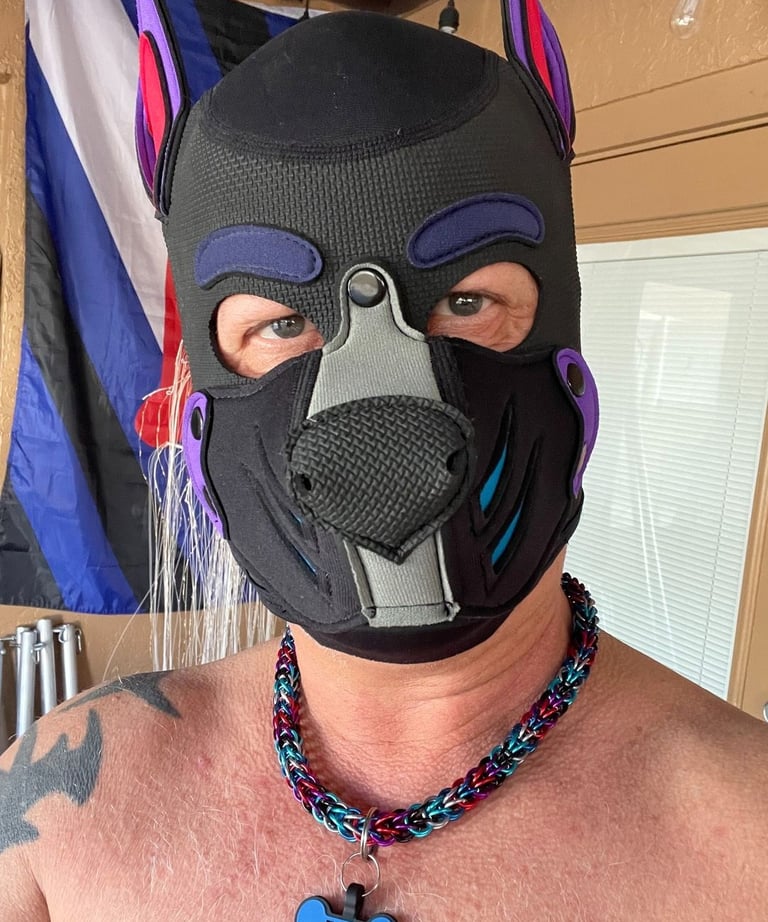 Man in pup mask