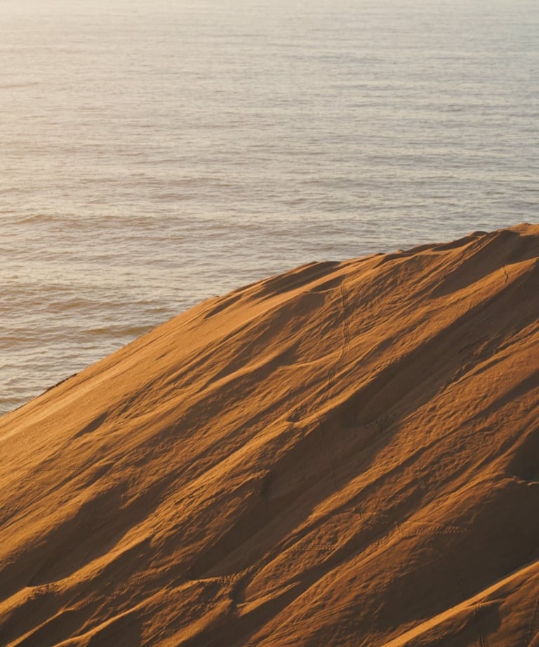 moroccan sanddunes with ocean background