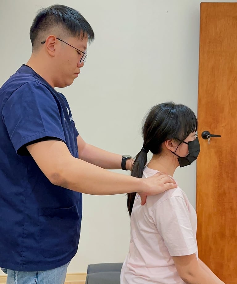 Chiropractor assessing patient’s posture during chiropractic treatment at Sinisana Chiropractic.