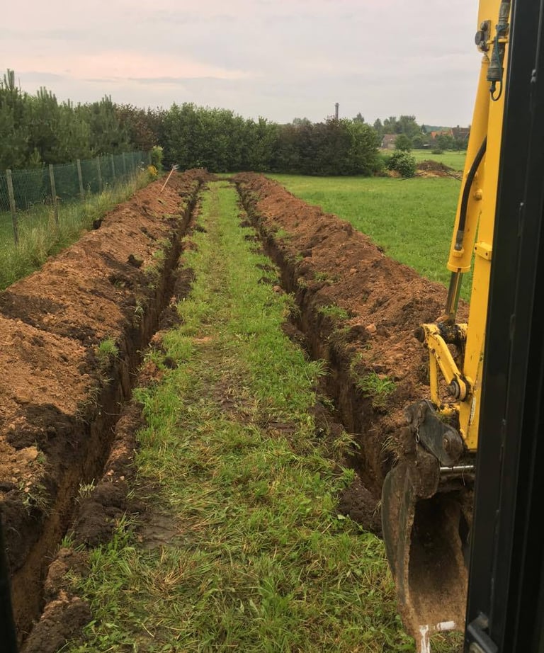 Geoterminis sildymas, horizintalus kasimas, 200metru transejos ir po to klojamas vamzdis