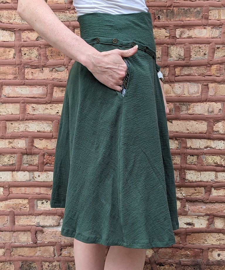 Knee length green skirt