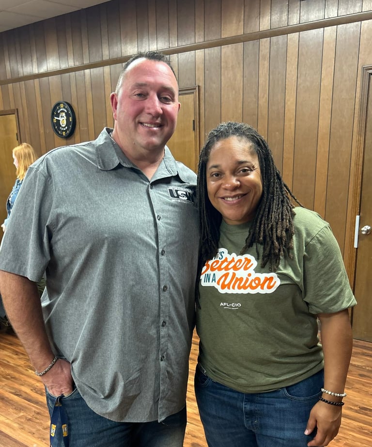 a man and woman standing in a room