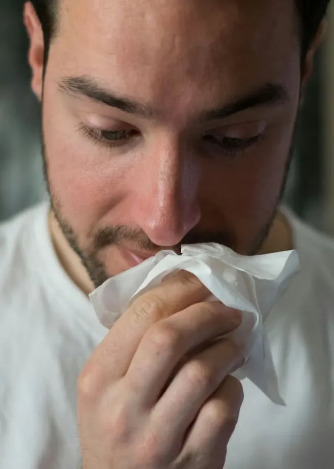Hombre resfriado