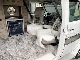 a van with furry chairs