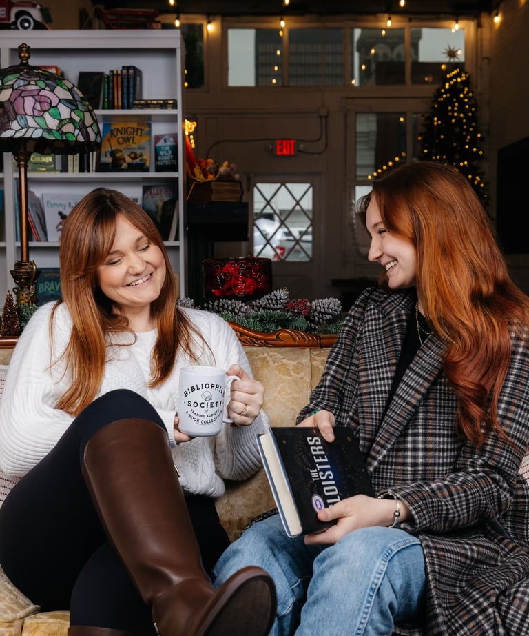 Kandelyne and Katie sitting on the couch together