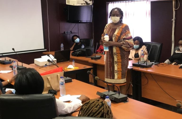 a woman in a mask mask and a mask on a table