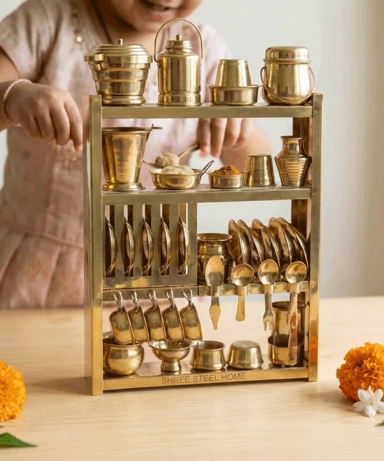 Girl playing with miniature brass kitchen set