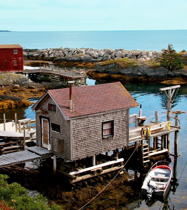 small cabin with boat near dock in LUNENBURG Nova Scotia