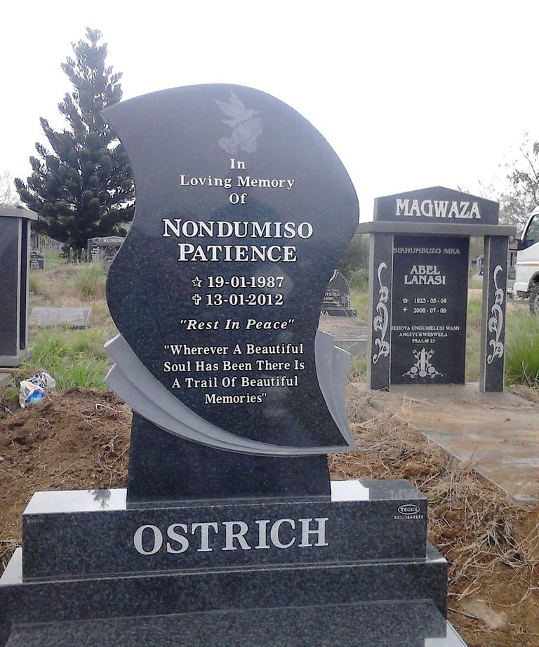 Custom teardrop headstone fitted with a ledger