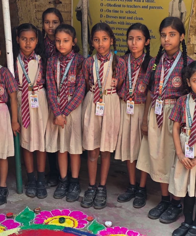 Vishwa Bharati Shiksha Sadan students making Rangoli during Diwali celebrations.