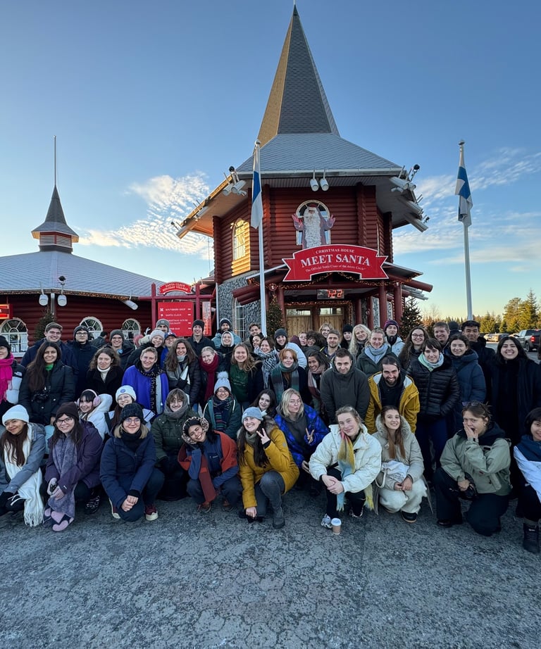 a group of people standing in front of a building