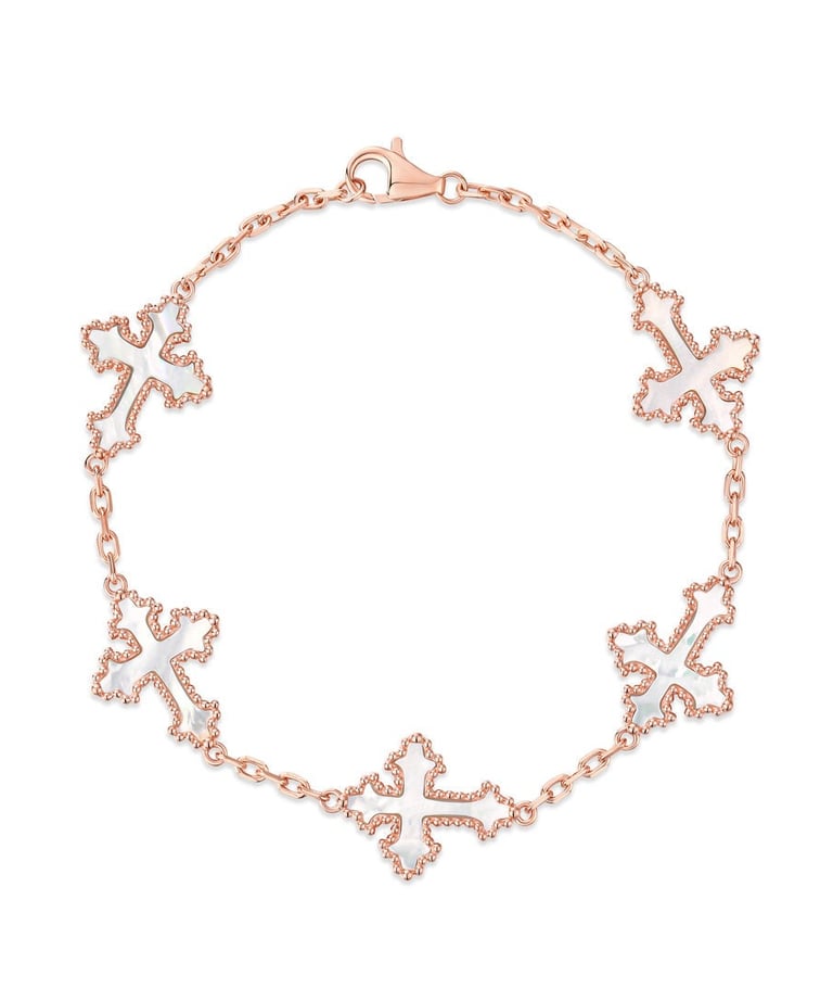 a bracelet bracelet with a cross - cut out of the middle