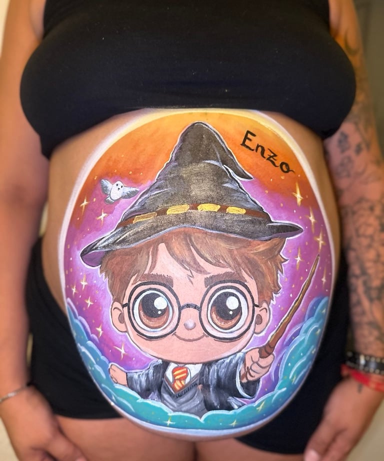 Harry Potter belly painting on a pregnant woman featuring a cartoon wizard and Hedwig the owl.