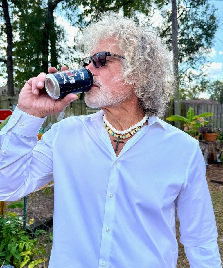 Brad Walling drinking Texas Shoreline spring water from a recyclable aluminum can