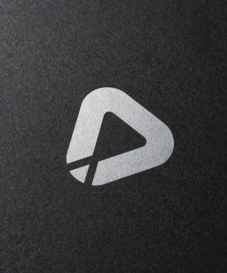 Modern minimalist logo of a software company presented on a textured dark paper, premium lighting.