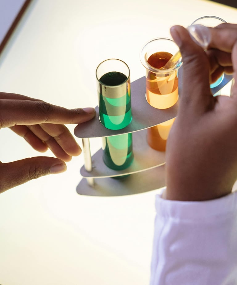 a person holding a tray with a tray of liquid