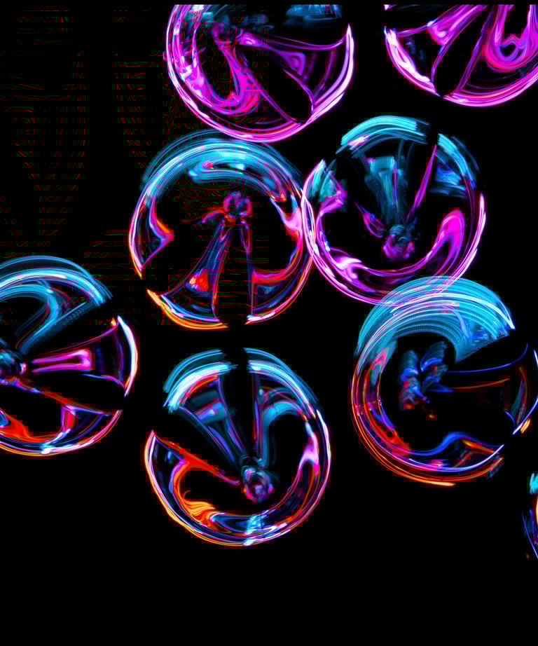 a group of bubbles lit by neon lights