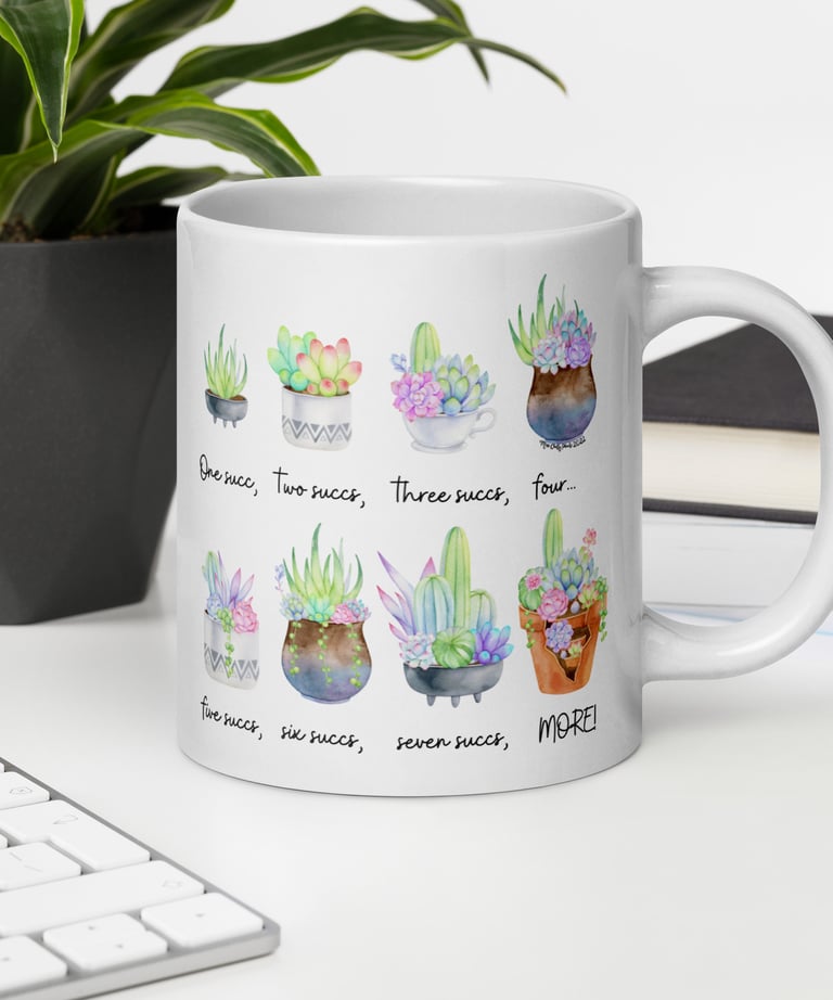 White succulent-themed ceramic mug with colorful plant illustrations — Miss Chatty Plants drinkware collection.