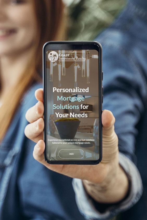 smartphone showing de Coast Investment Realty website