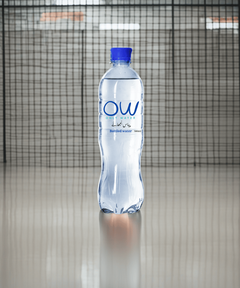 a bottle of water sitting on a table