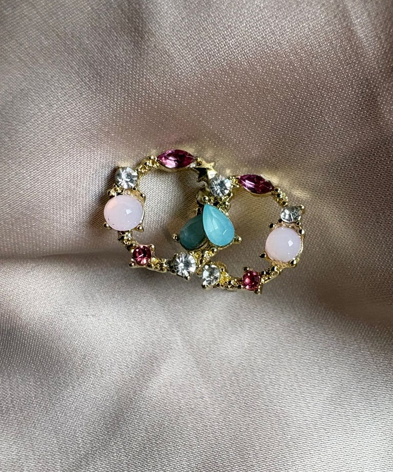 a ring with a peace sign and a peace sign