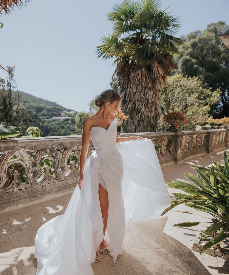Beautiful fashionable bride wearing low bun on her wedding photoshoot