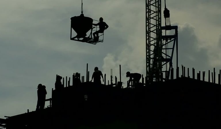 a crane is being lifted by a crane