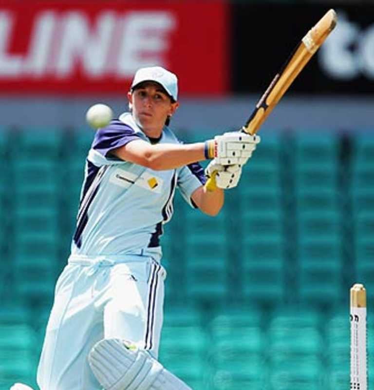 Michelle Goszko playing a pull shot.