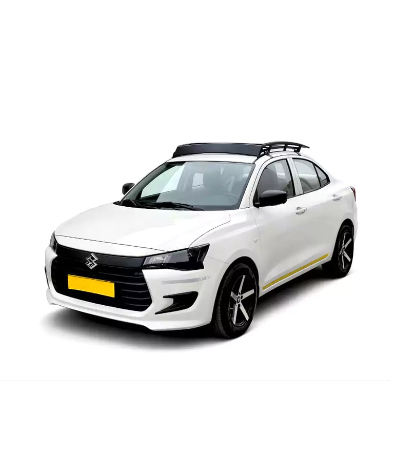 White Maruti Dzire one way taxi by Saini taxi services with a luggage carrier rack