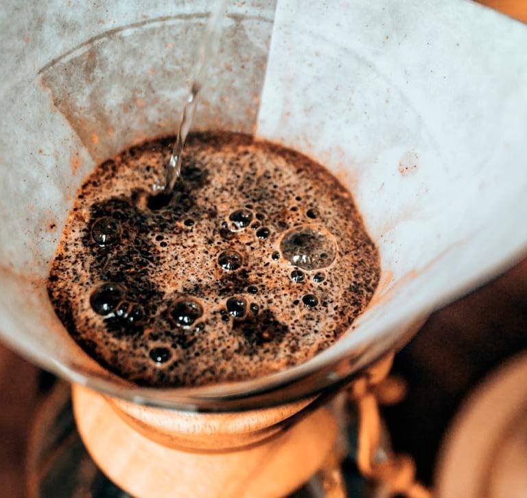 Specialty Colombian coffee being prepared using pour over technique
