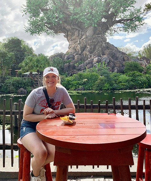 Kasey Kalk pictured with her husband in front of the Tree of Life at Disney's Animal Kingdom®.