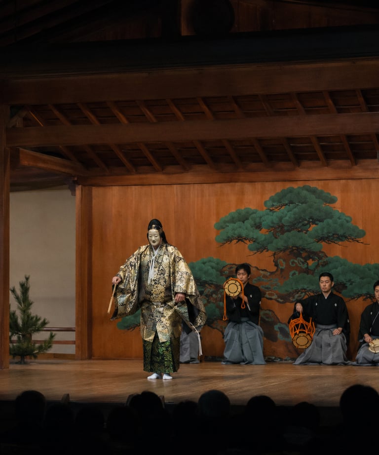 A Japanese Noh theatre performance featuring a masked actor in a gold kimono and musicians on a wooden stage.