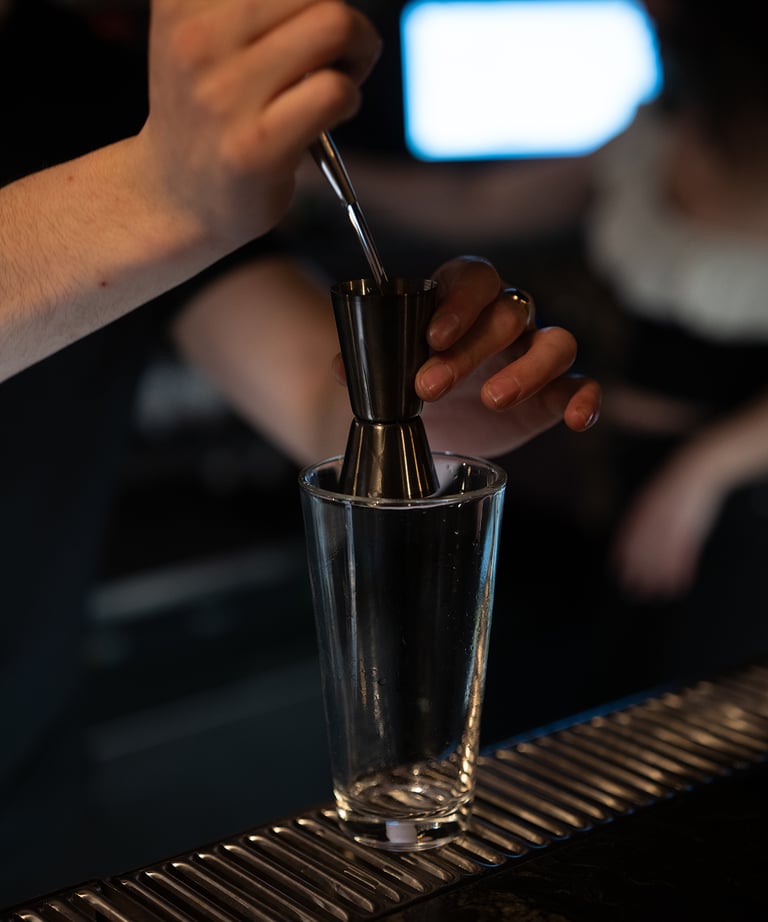 TwentyTwo Bar tender making cocktails