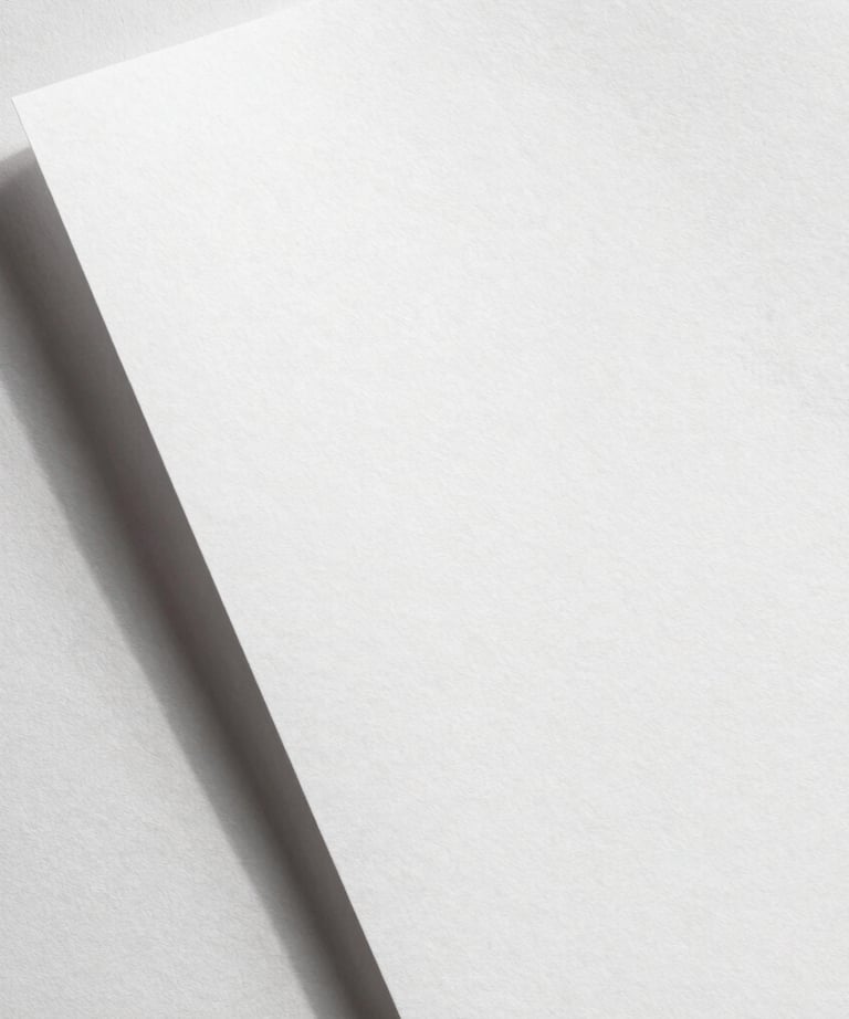 Abstract study of shadows on a textured paper white wall. Clean and minimalist. South Asian / Global Professional aesthetic.