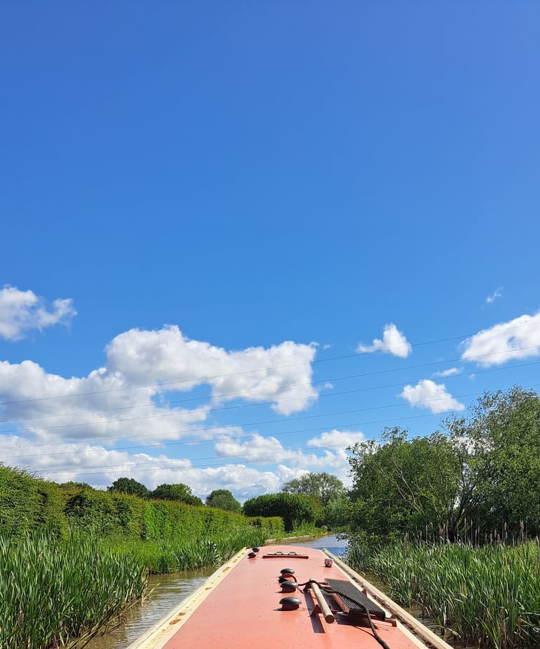 a boat on a river with a person on it