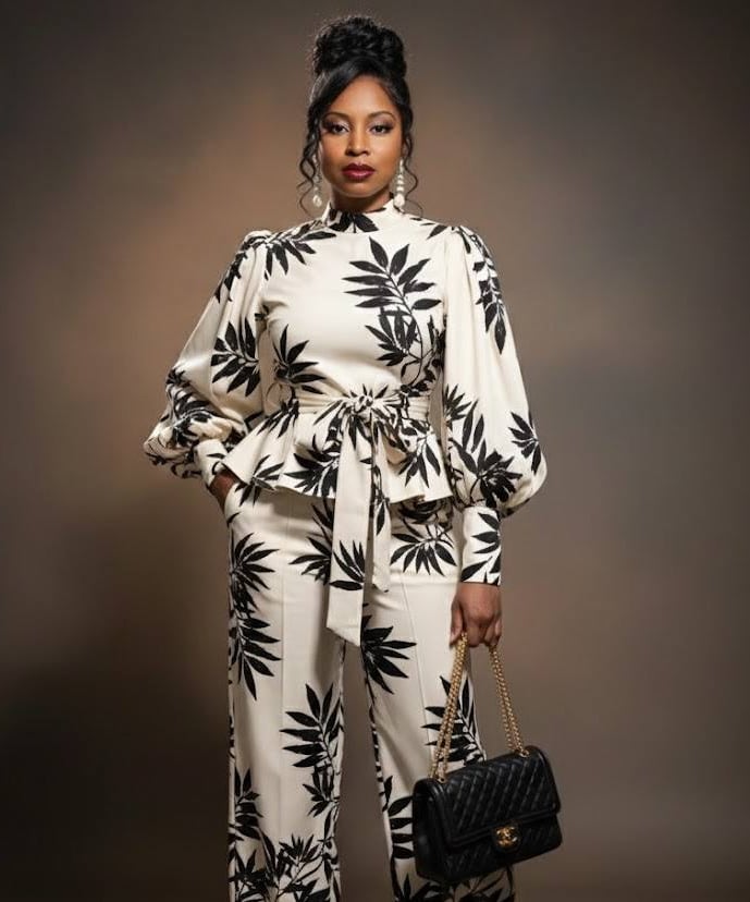 Ruby Mae Davenport standing with poised confidence in a timeless patterned outfit, reflecting grace,