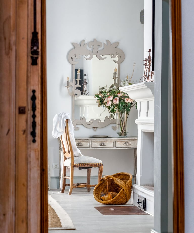 Master Suite at Finca Santa Katerina, showing antique furnitures and a fireplace