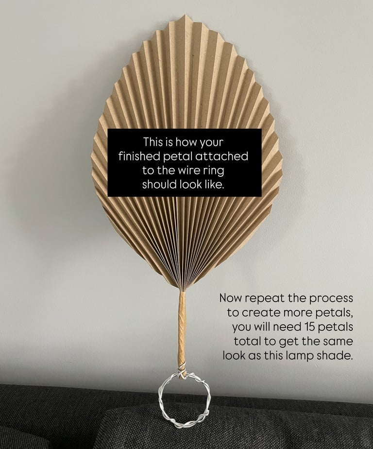 finished flower petal for DIY lamp shade, taped with brown paper tape and wire ring
