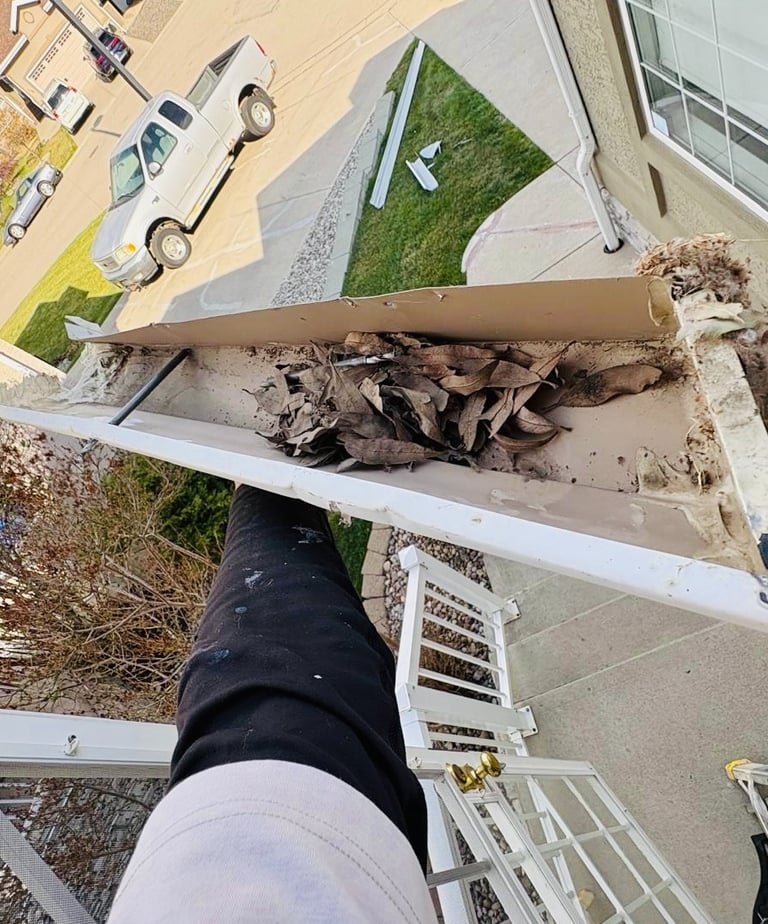 Exterior gutter repair project restoring proper water flow and preventing foundation damage in Calgary.