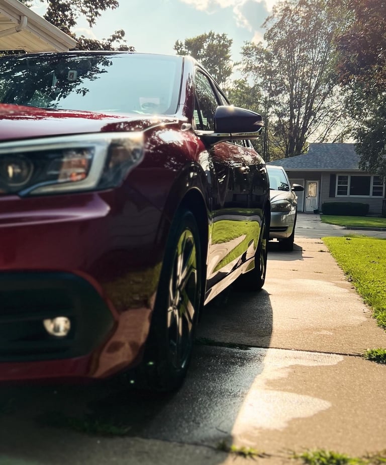 Professional mobile car wash removing grime and restoring a car’s shine