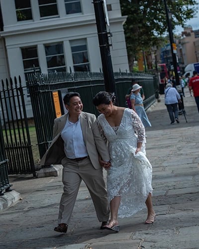 Newley-weds walking around the streets of Greenwich