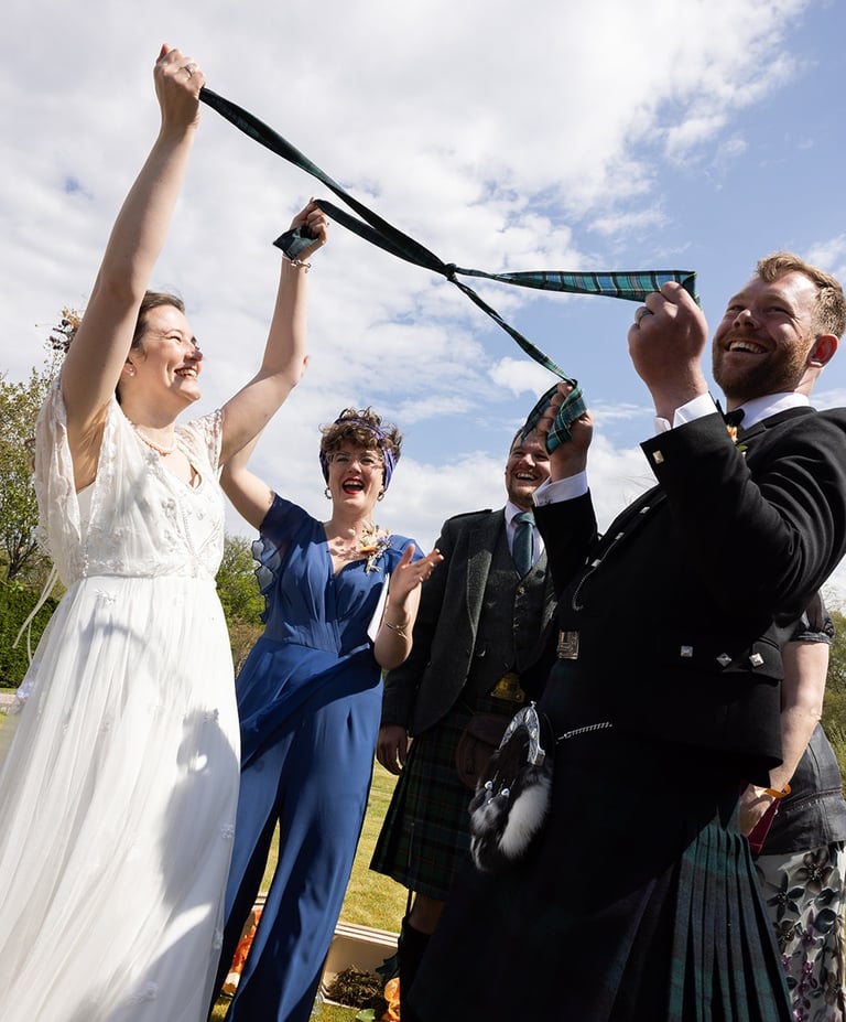 a wedding couple handfasting