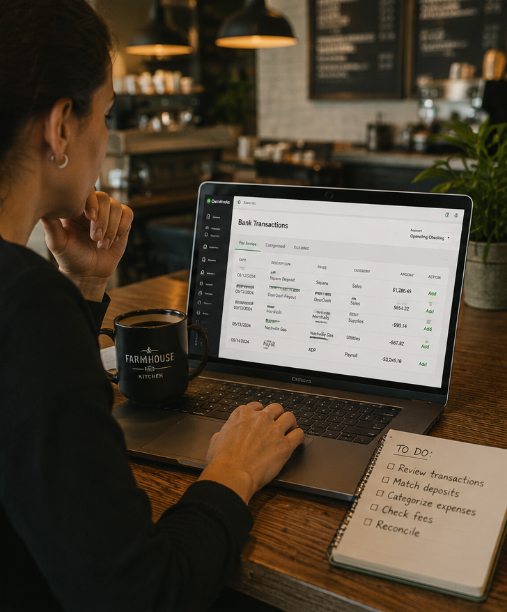 Bookkeeper reviewing imported QuickBooks transactions for accuracy
