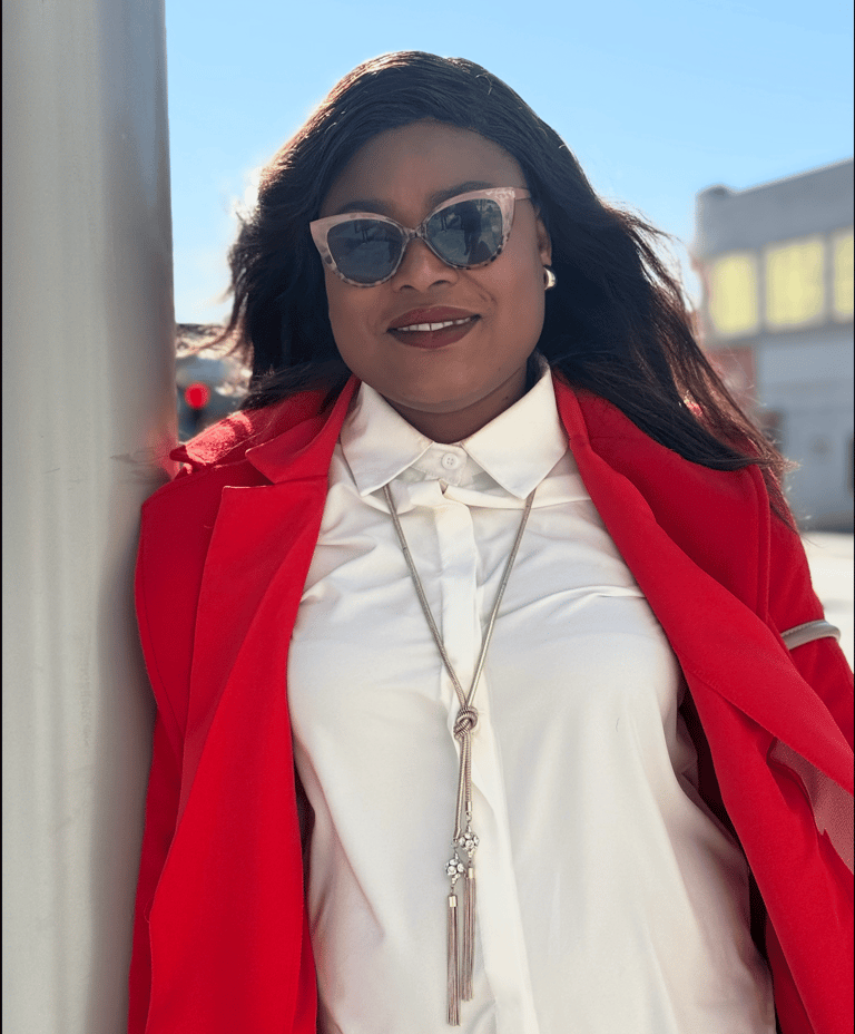 Oretha Quarcoo, Operational Lead of Guiding Light Press, managing day-to-day activities & clients