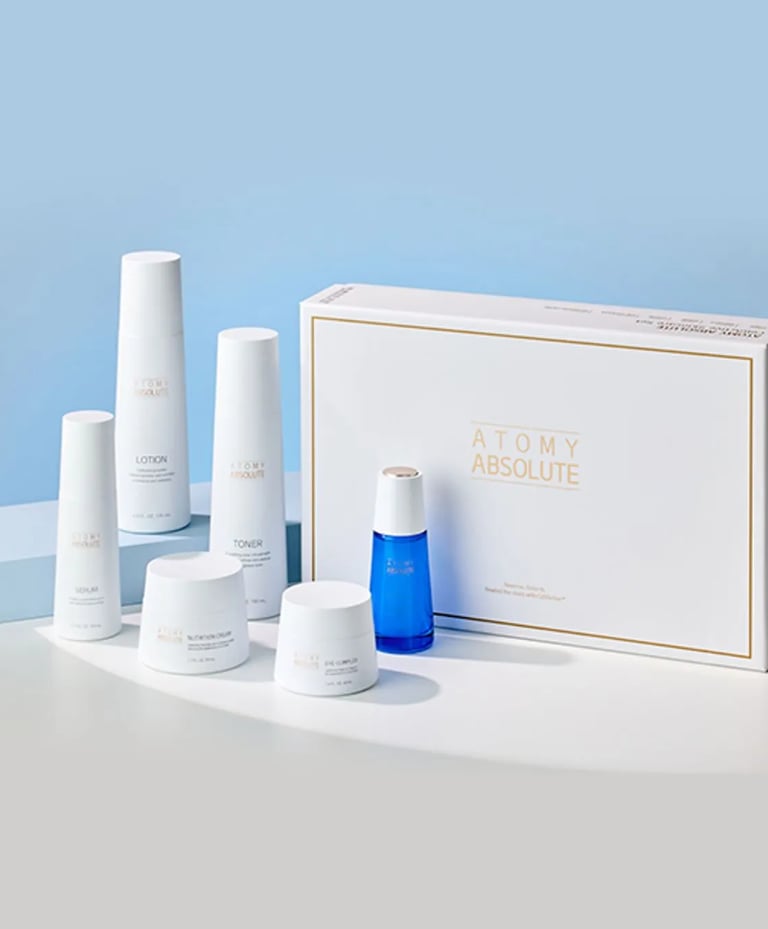 a box of skin care products including a bottle ATOMY of lotion