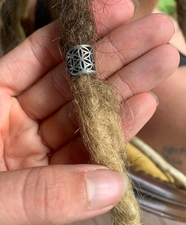 a dreadlock with a bead